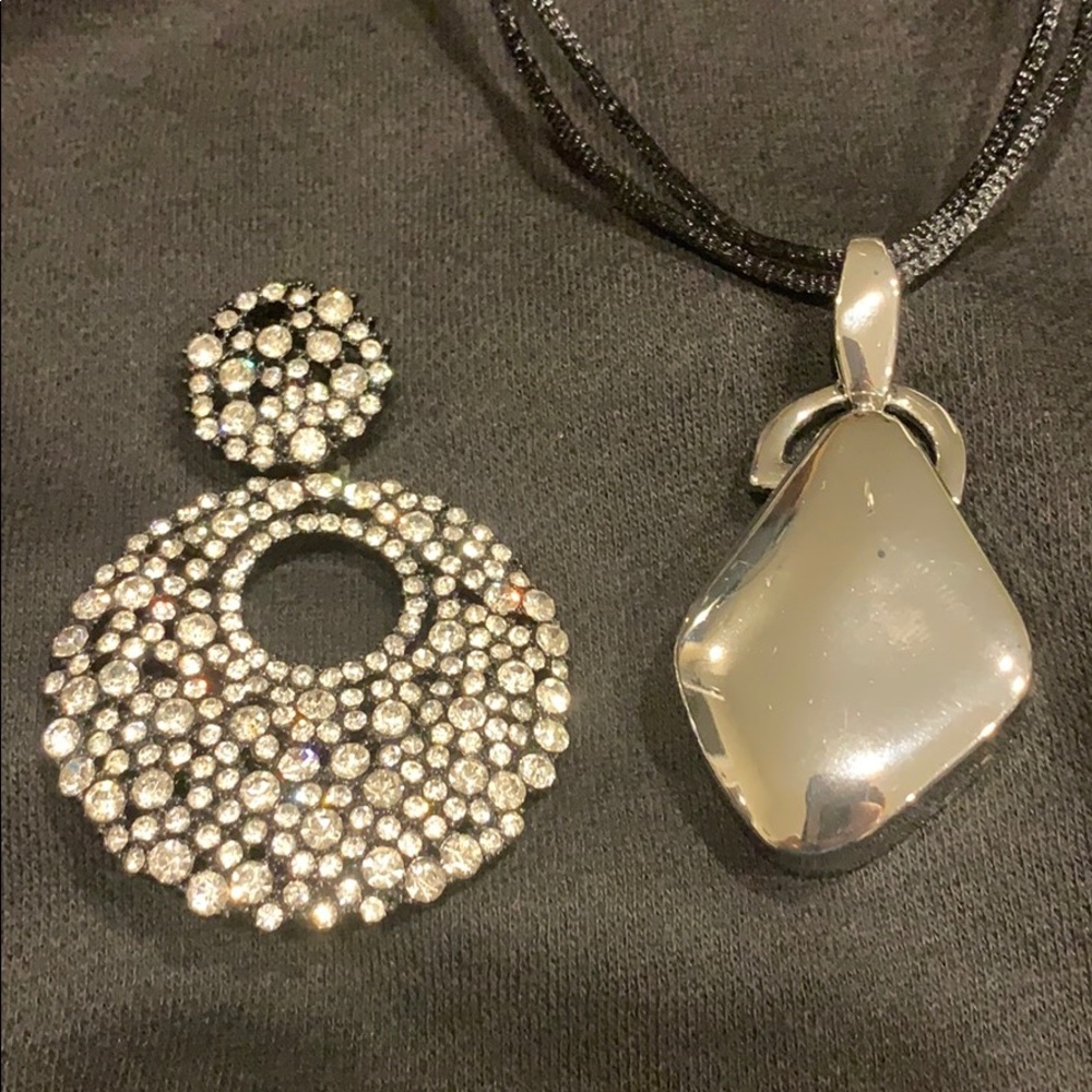 Two pendants with one silk ribbon